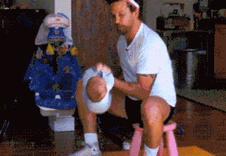 Dad excising with baby