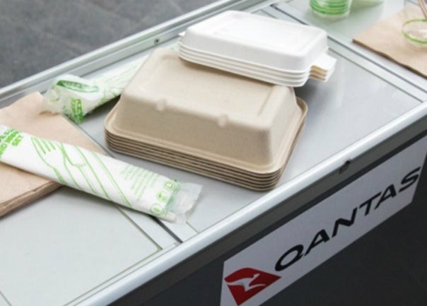 Qantas serving cart with environmentally friendly cutlery and plates