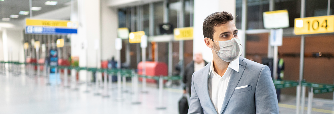 Man with mask at airport