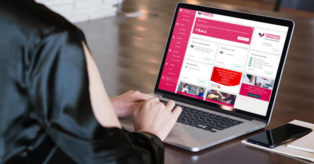 Hands typing on a laptop, representing efficient business travel management