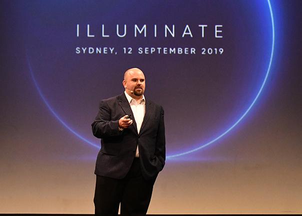 John Morhouse on-stage at Illuminate 