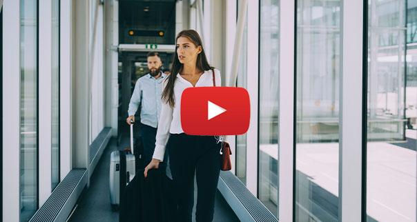 People walking onto plane.