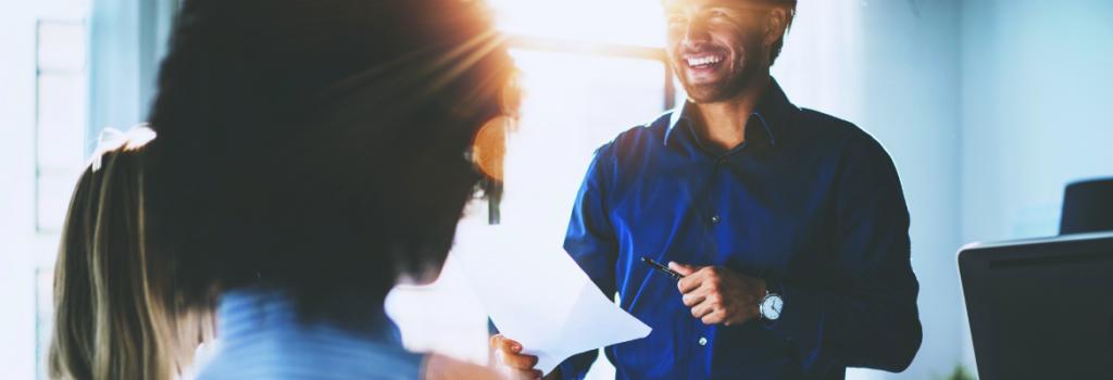 Man presenting to group of people