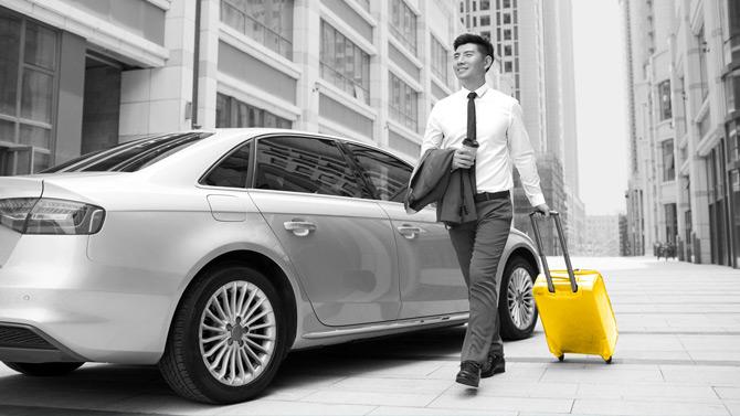 Hertz car walking man suitcase