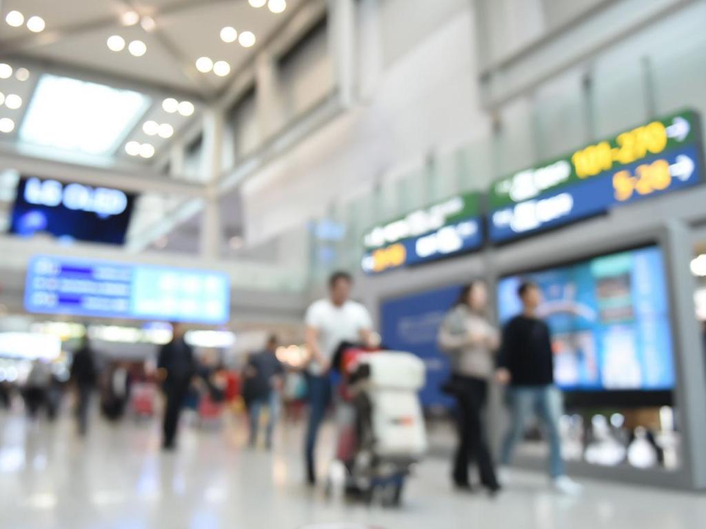 Blurred image of people in airport