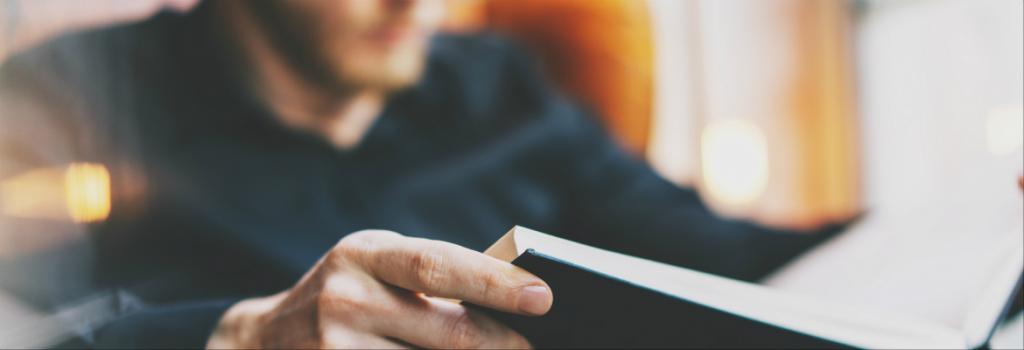 Male reading a book