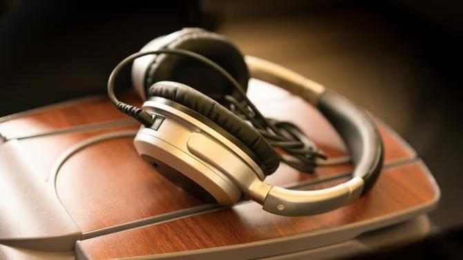 Earphones representing inflight airline entertainment. 