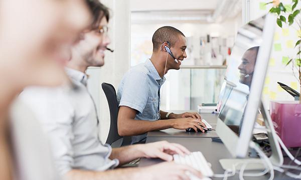 Dedicated travel consultants working on a desk