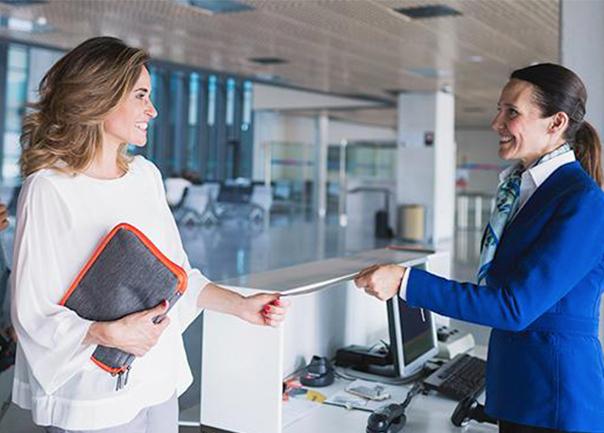 businesswoman boarding a plane, optimising her travel