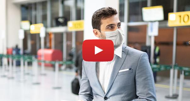 Man in airport with mask