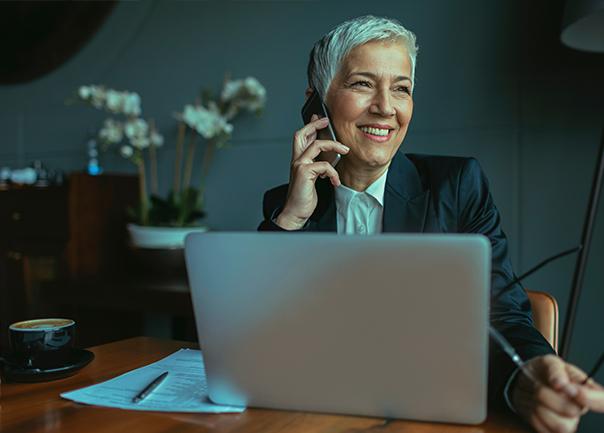 Lady on the phone smiling