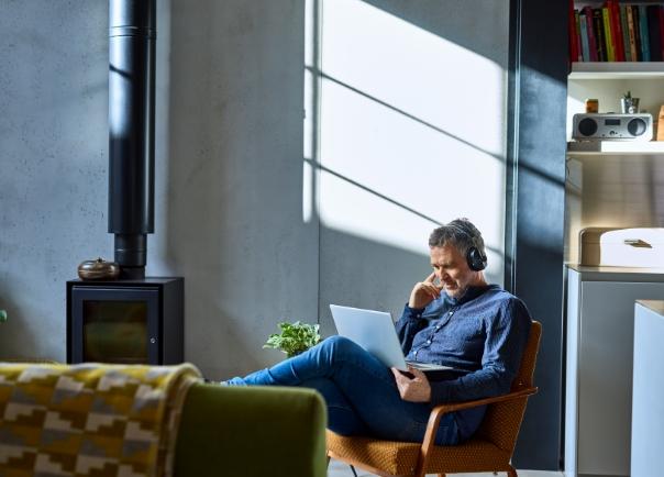 CEO reading at night on laptop