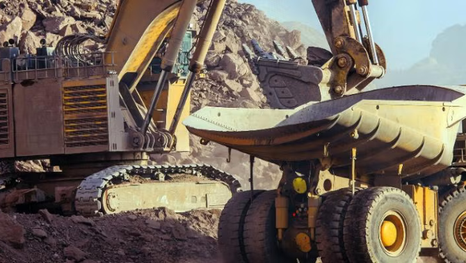 Construction vehicle in an open field demonstrating how smarter travel maximises savings for Aletek.