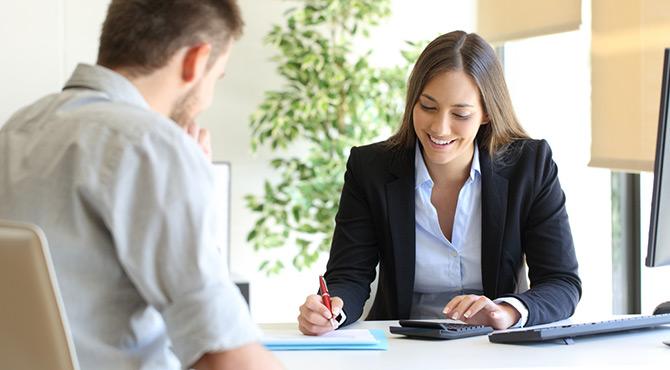 Business Woman signing document