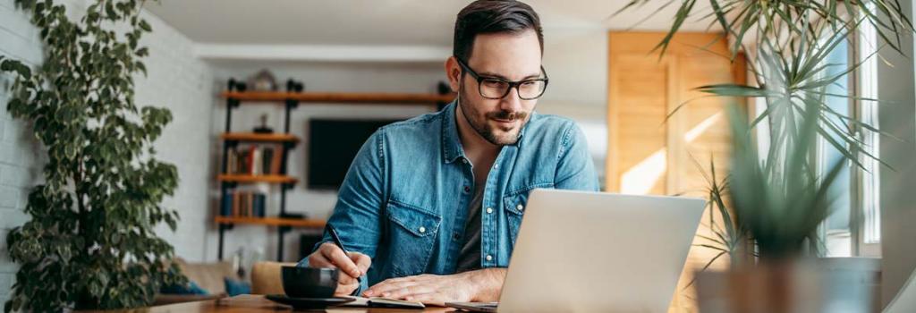 man looking at computer