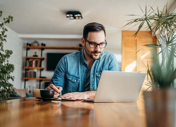 man looking at computer