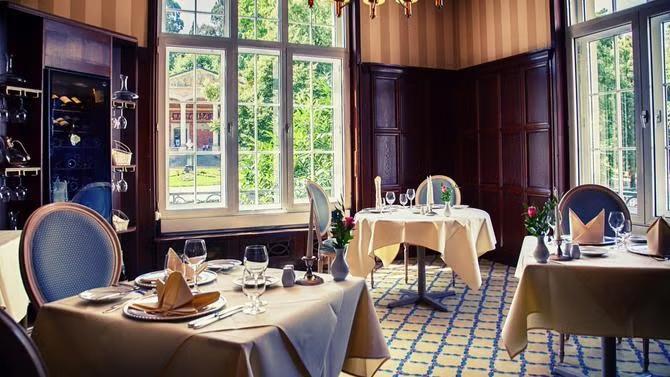View of restaurant dining room, showcasing tourist attractions as part of a destination travel guide.