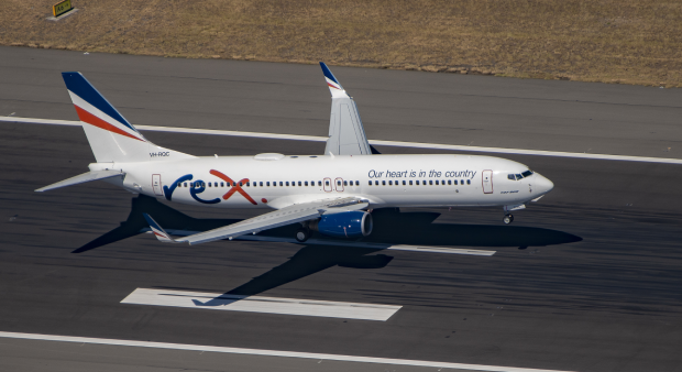 Rex plane on runway